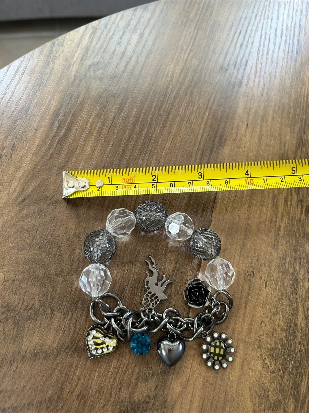 Silver Charm Stretch Bracelet with Clear Beads and Multiple Charms